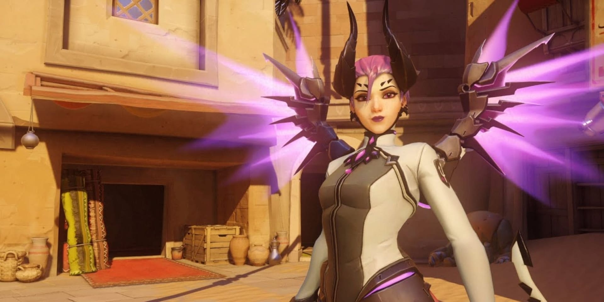 Angela Ziegler in a futuristic outfit stands in a sunlit marketplace, with striking purple energy emanating from their arms.