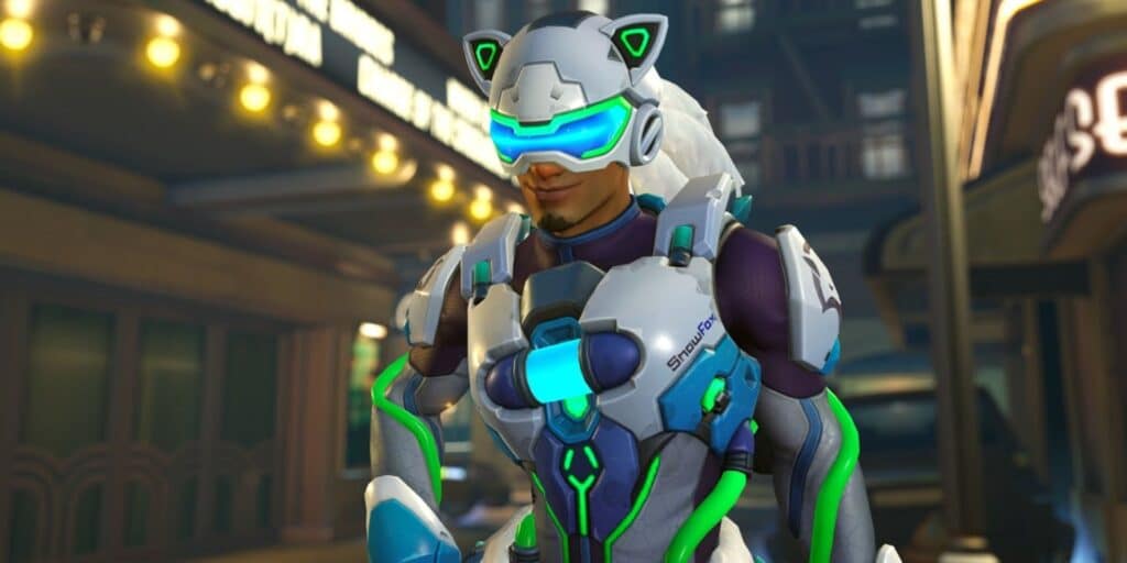 Lucio with neon-blue visor and fox-ear helmet. He stands confidently in front of a lit building